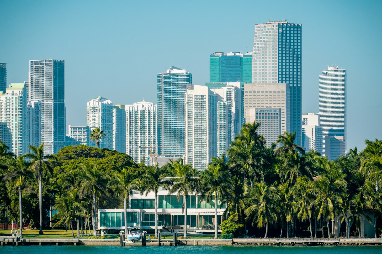 Green waterfront park beside Miami high-rise buildings